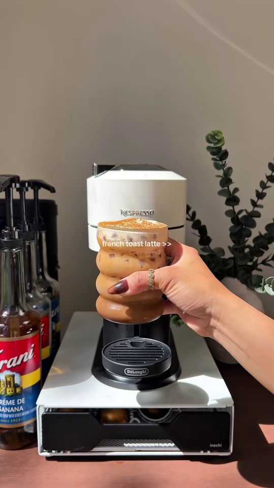 Editorial coffee and condensed milk drink on kitchen counter